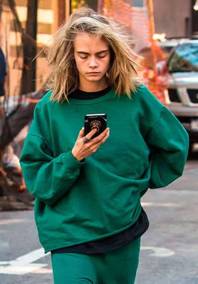 Cara Delevingne should focus on the road instead of her phone