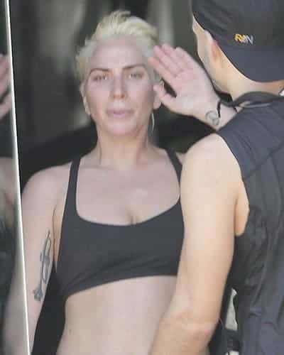 Lady Gaga waving at the gym without makeup