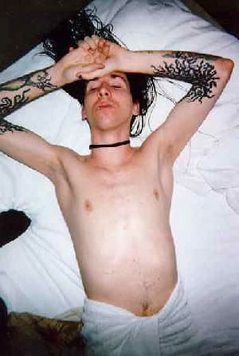Marilyn Manson passed out in bed