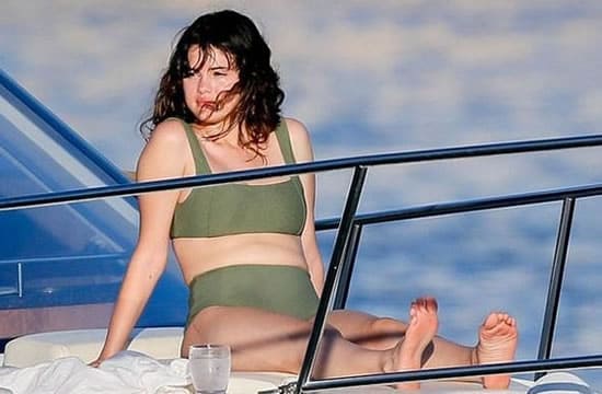 Selena Gomez sunbathing on a yacht