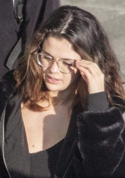 Selena Gomez wearing spectacles