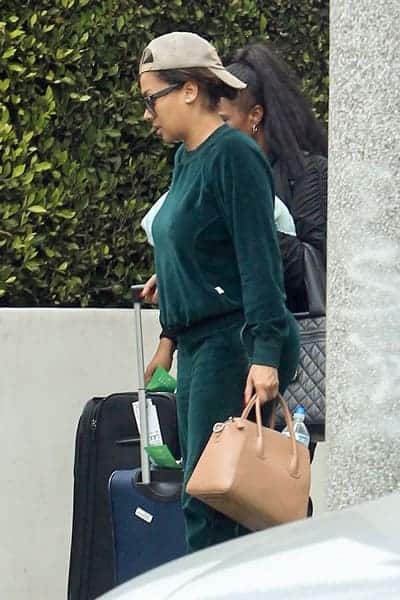 Lala Anthony rushing to airport