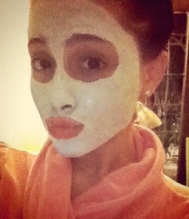 Ariana Grande with face mask on