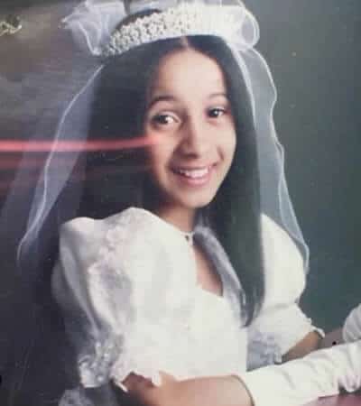 Cardi playing bride as a child