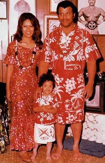 Small Dwayne Johnson with his loving parents