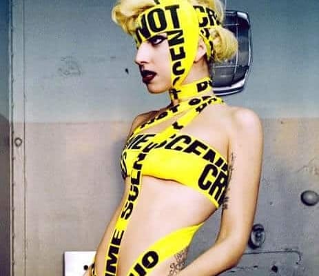 Lady Gaga crazy outfit using police crime scene tape