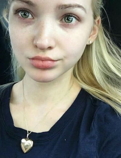Dove Cameron wearing the heart of gold