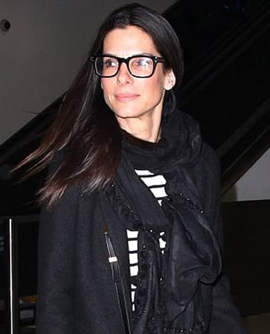 Sandra Bullock wearing eye-catching glasses