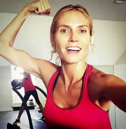 Heidi Klum flexing her muscles