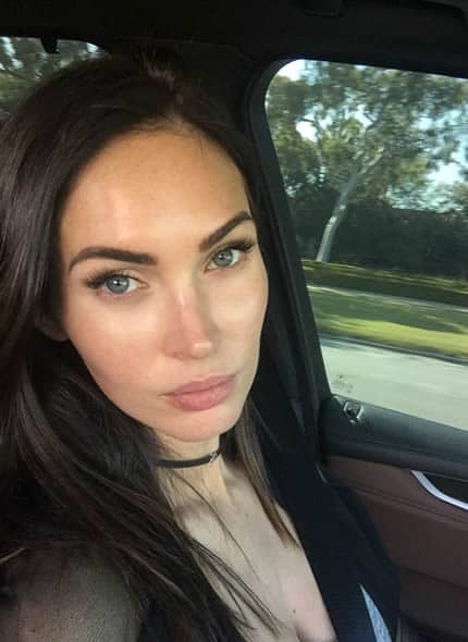 Megan Fox taking a selfie in a car