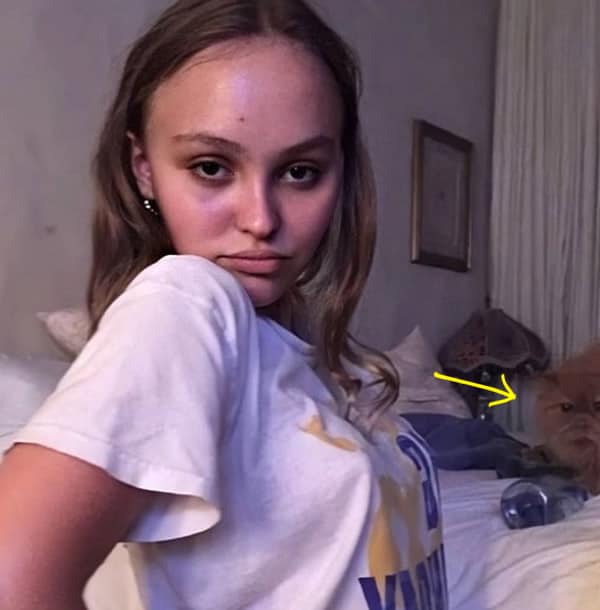 Lily Rose Depp in her bedroom with her furry cat