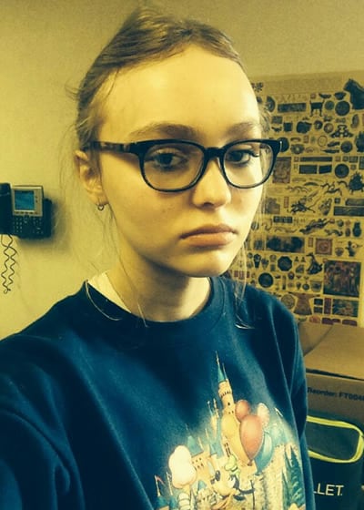 Lily-Rose Depp looking like a nerdy girl with glasses