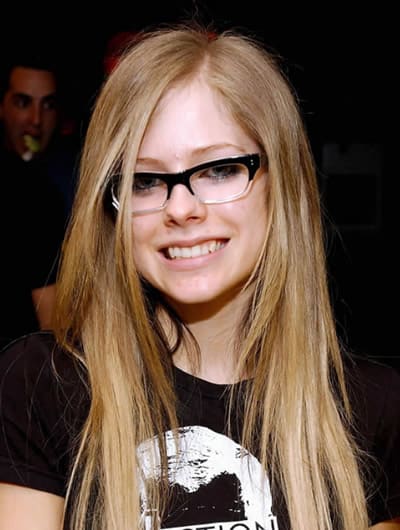 Avril Lavigne with black frame glasses