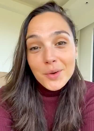 Gal Gadot smirk on her face