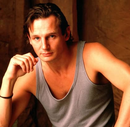 Liam Neeson looking handsome in a singlet