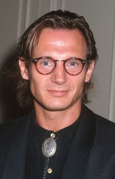Liam Neeson with glasses