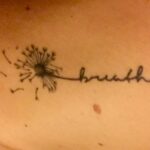 Dandelion With a Quote Tattoo