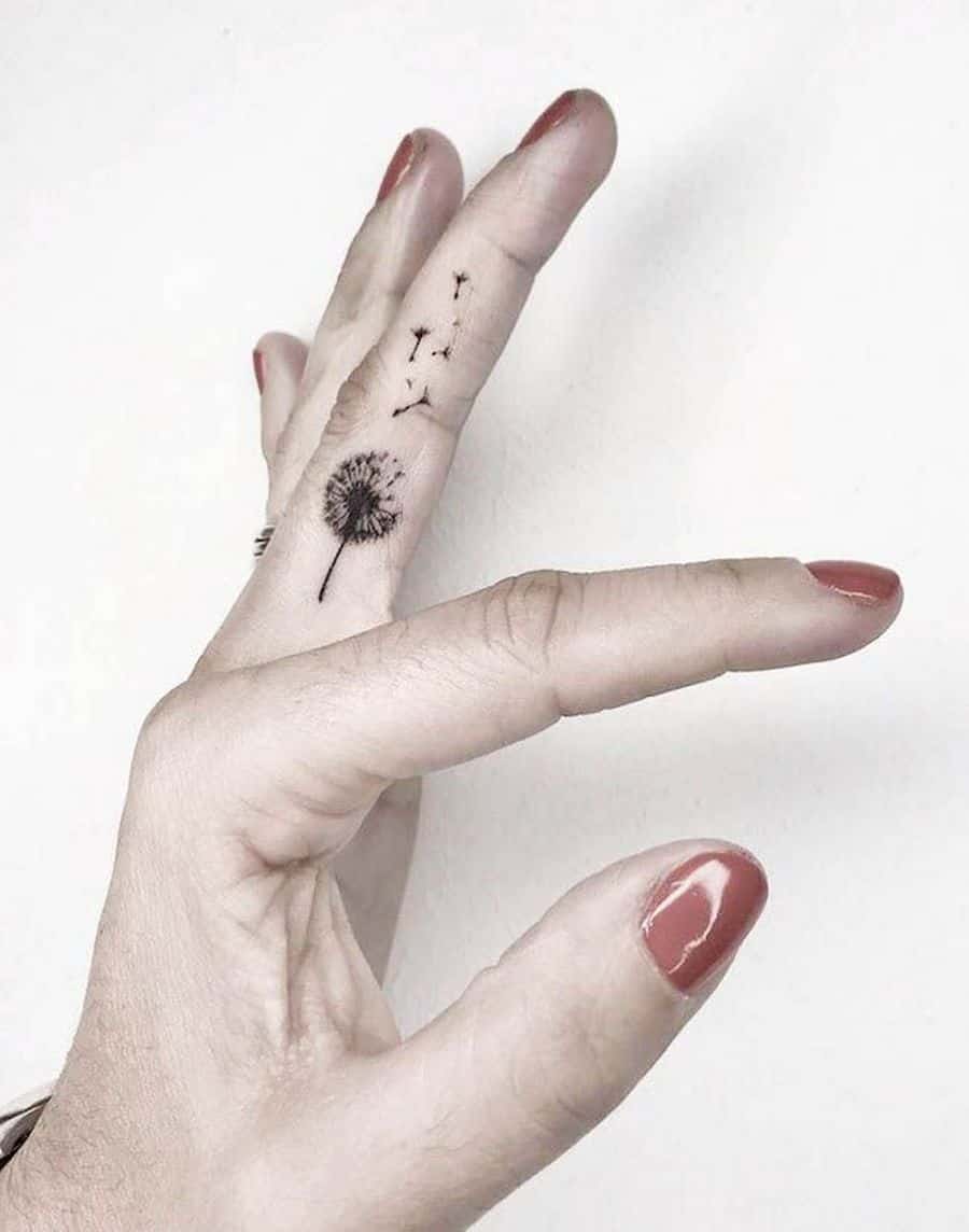 Finger Dandelion Tattoo